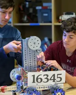 Students building a tower