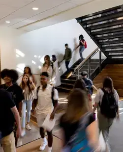 Students walking up and down stairs