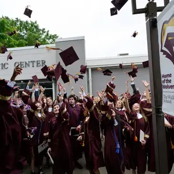 Graduation cap toss