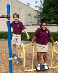 Students on playground equipment