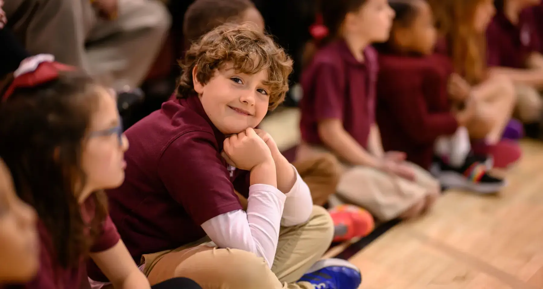 Student smiling at the camera