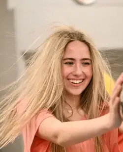 Student with static electricity in hair