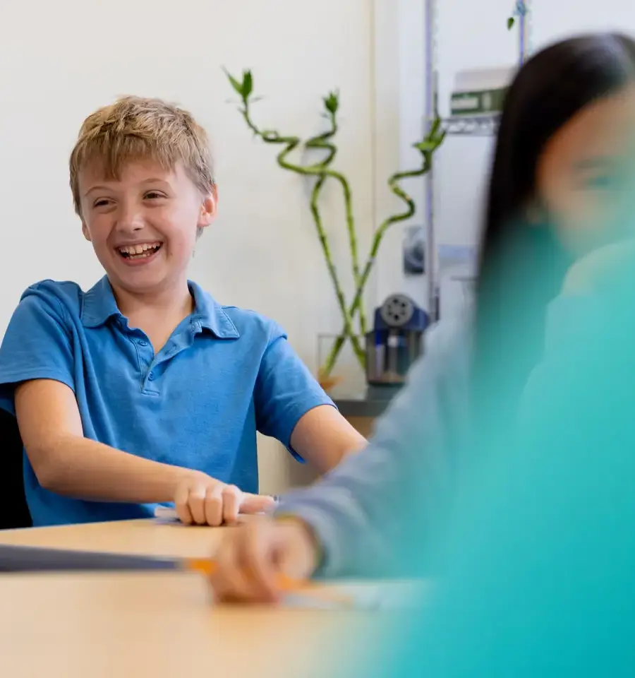 Student laughing in lesson