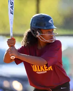 Softball player readying to strike a ball