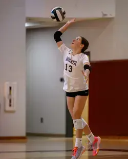 Volleyball player performing a spike