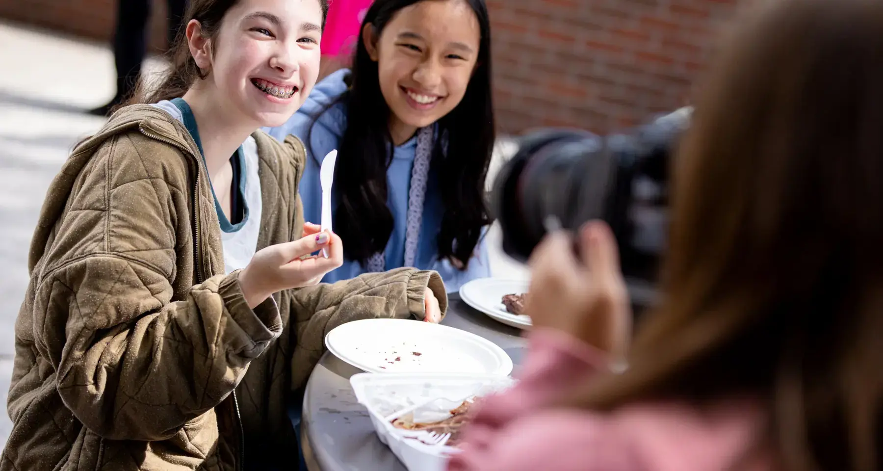 Students smiling at lunchtime