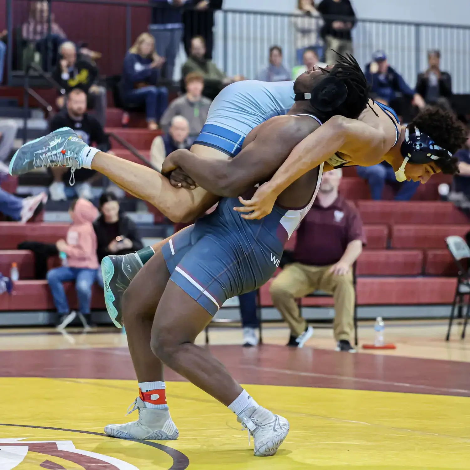 Student executing a judo flip